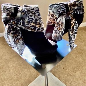 Animal print high heel boots with zipper on the side